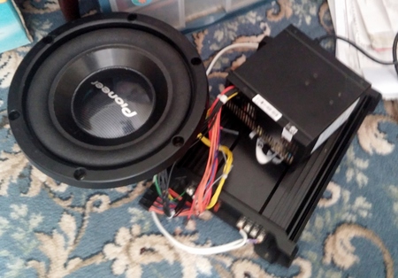 All the electronics. A 500W PSU from a old PC with all the 12v and ground wires bundled together.  Then using a 2000W bridgeable Lanzar Heritage car amp.